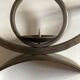 Pair of modernist candlesticks in beaten iron 1970