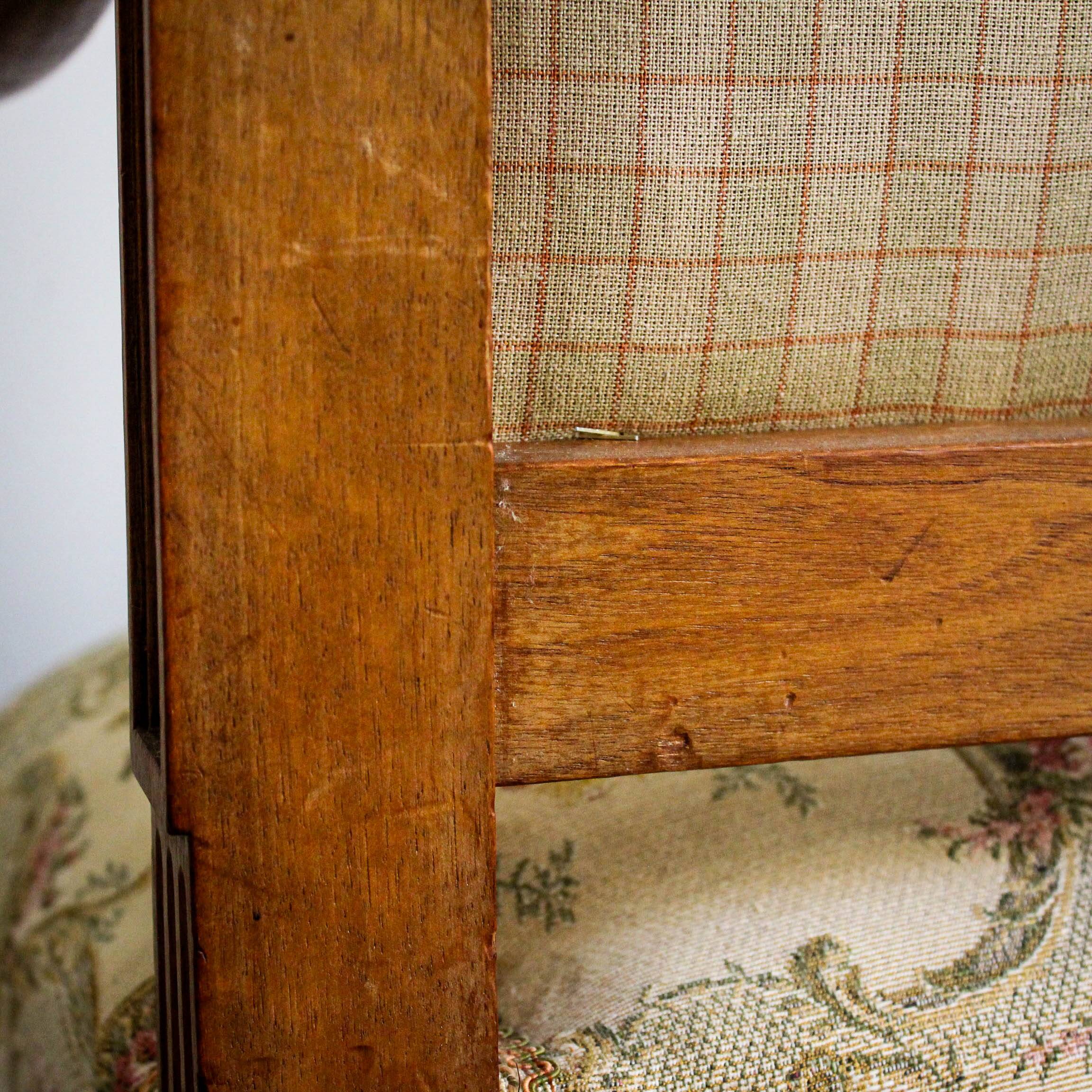 Louis XVI style carved armchair