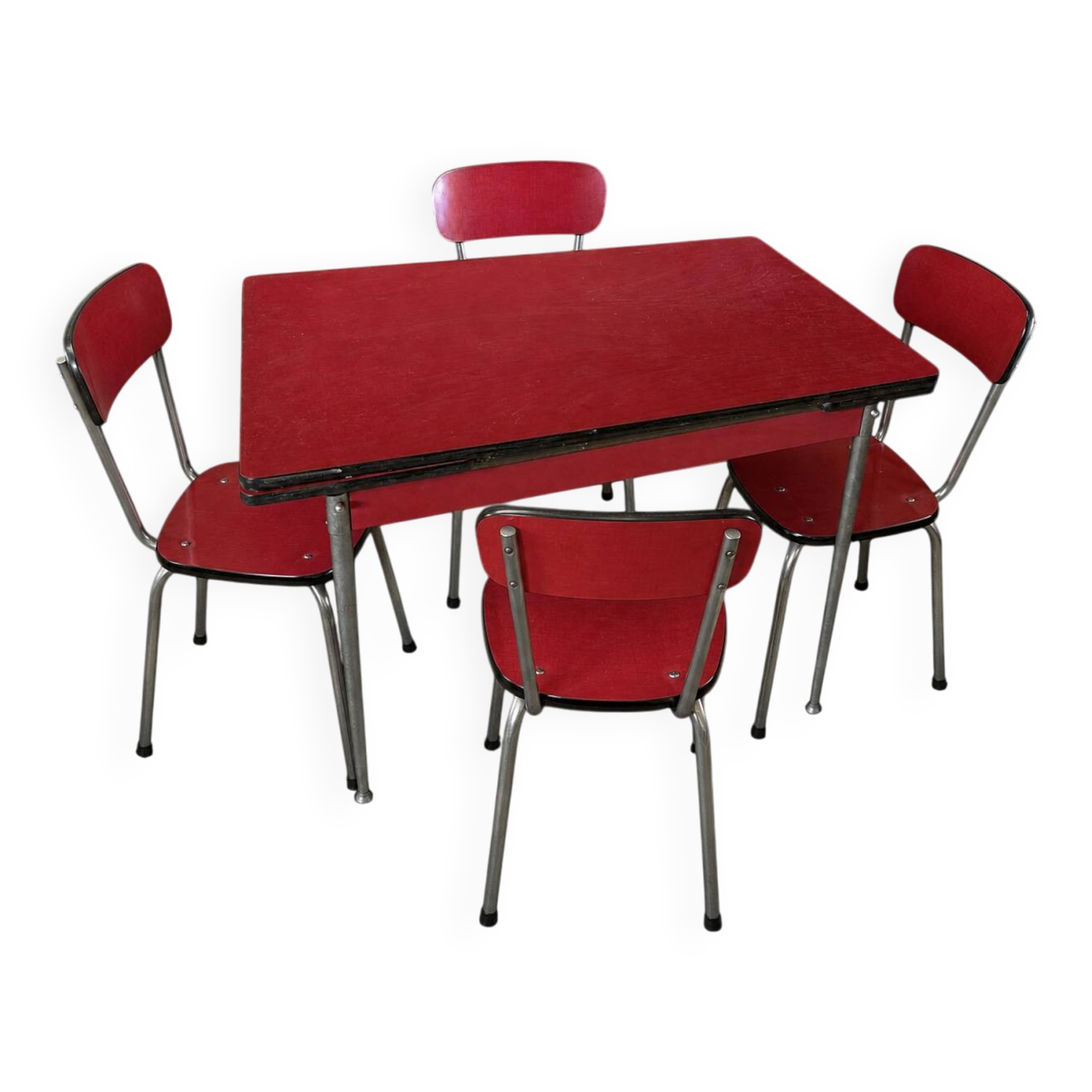 Vintage kitchen table in red formica and its 4 chairs.