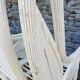 Pair of white rattan armchairs