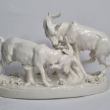 Saxon porcelain group, two fighting goats, signed Röhle, 1900
