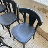 Set of 7 black bistro chairs