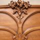 Double bed from the Art Nouveau period – Carved mahogany – Relief flowers