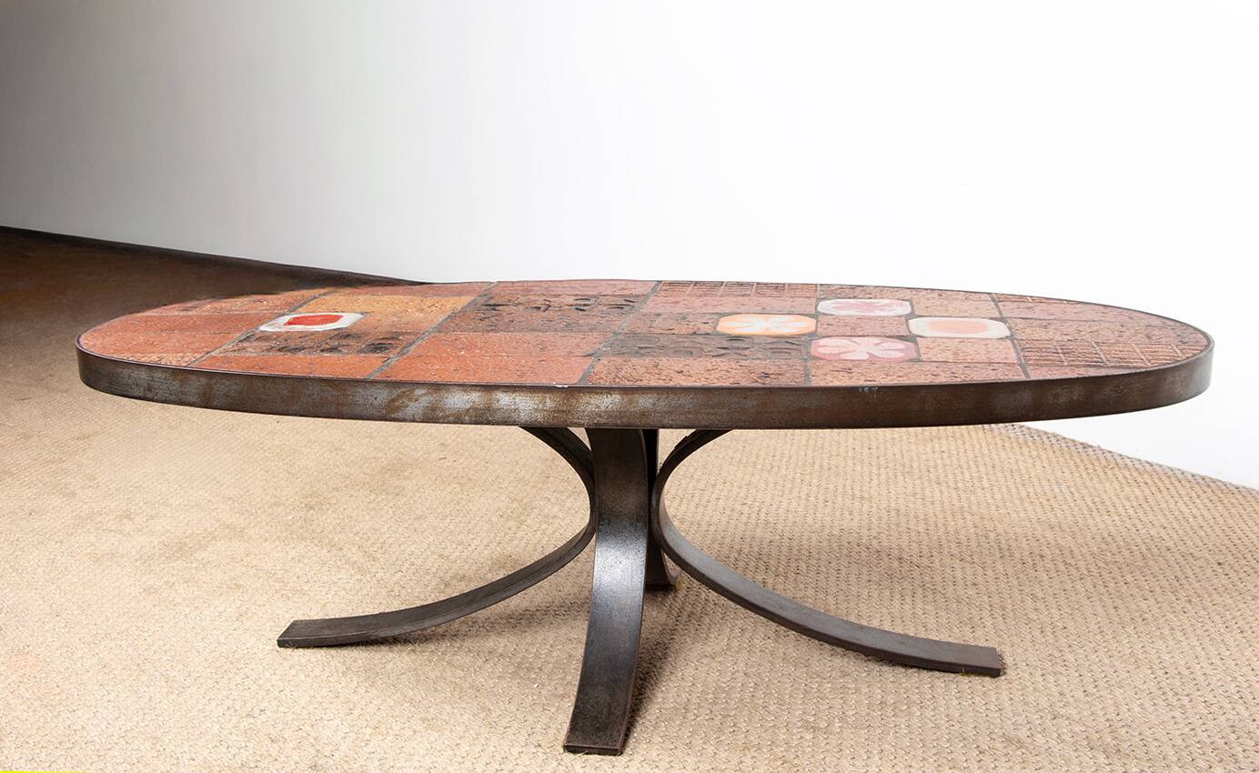 Lava stone, ceramic and steel coffee table by Jean Jaffeux 1960.