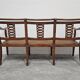 Directoire canapé in walnut with brass inlays, late 18th century.