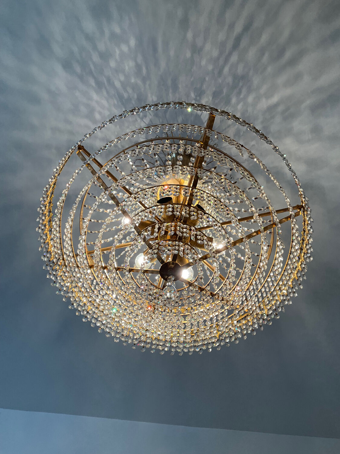 Brass chandelier and crystal tassel waterfall