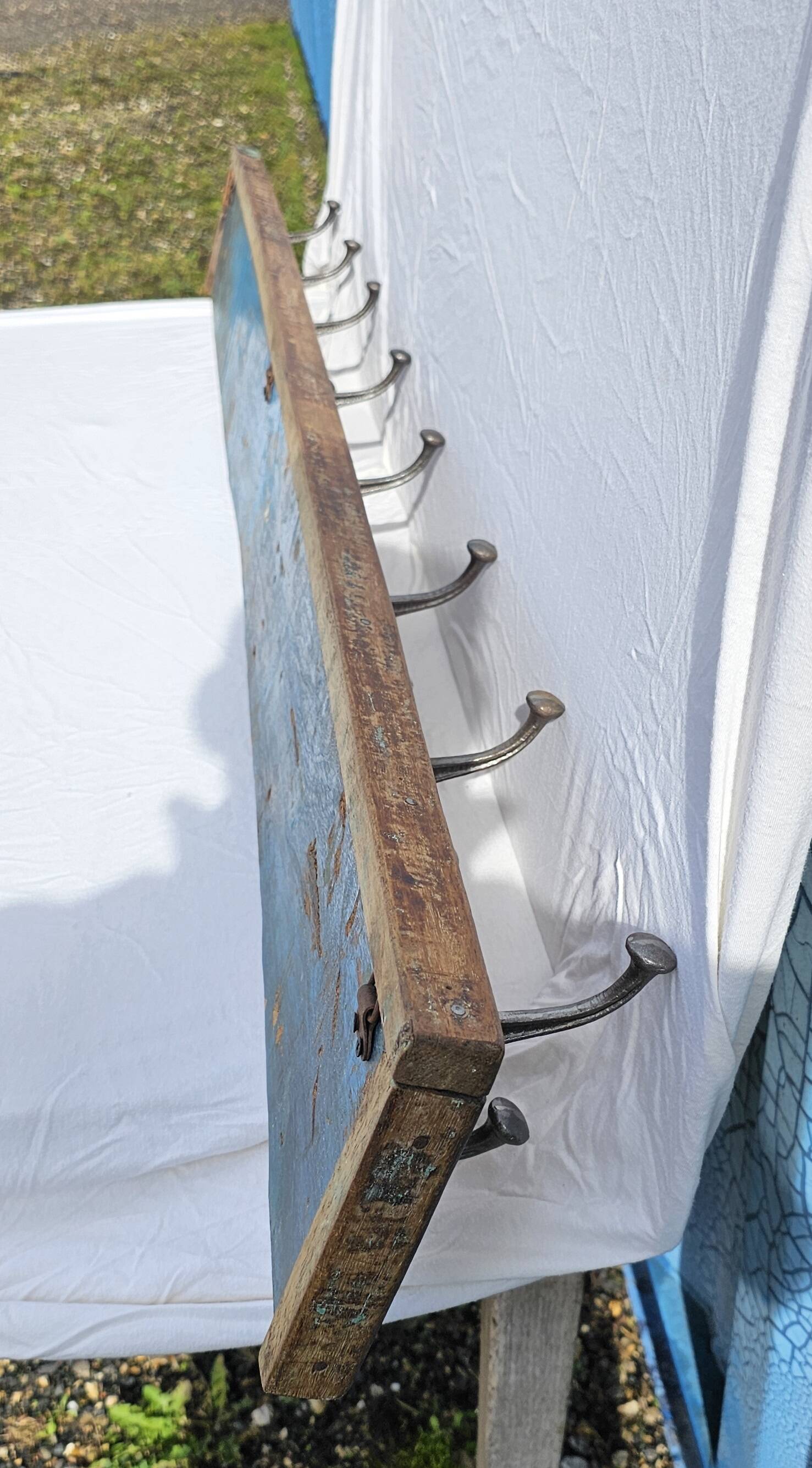 Teak coat rack with 8 double cast iron hooks