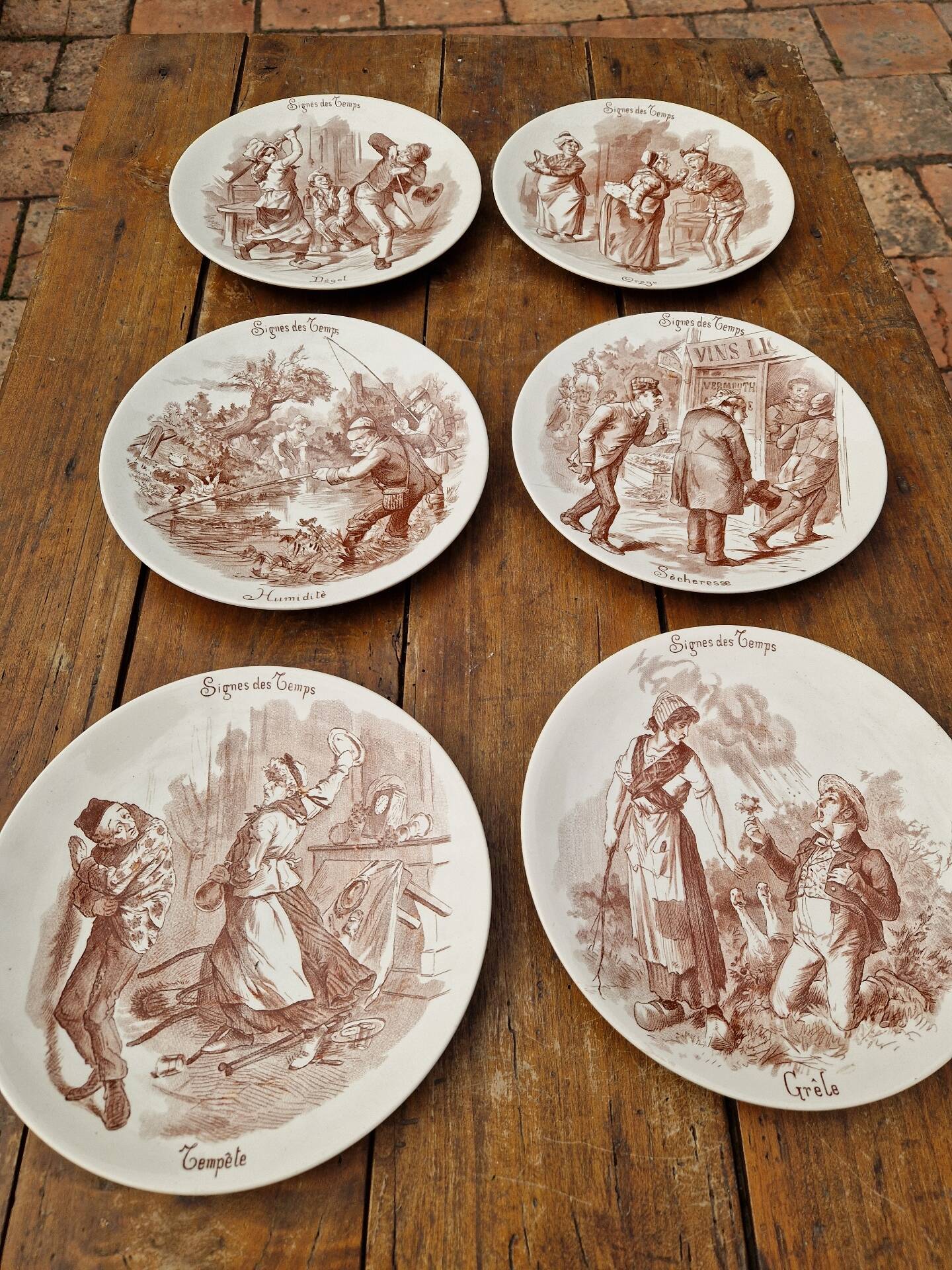 Set of 6 earthenware plates from Sarreguemines U&C Signs of the Times.