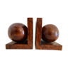 Pair of wooden bookends, art deco, Amboine magnifying glass balls