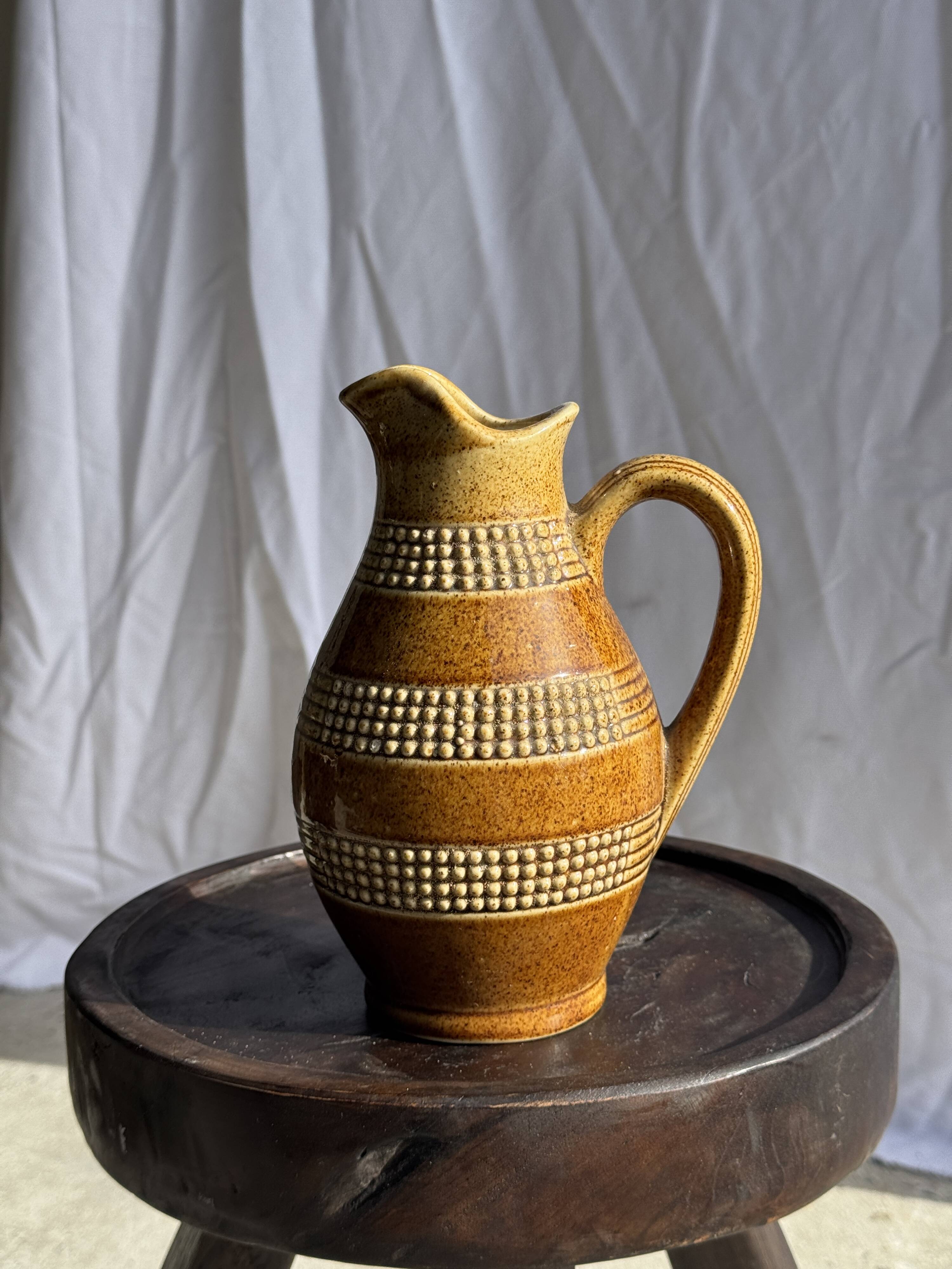 Vintage yellow stoneware carafe with beaded friezes Made in France H22