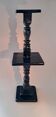 Column in blackened oak with two shelves.