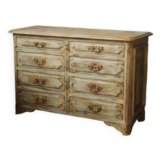 Old beige patinated chest of drawers