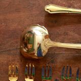 Golden cake cutlery service