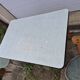 Vintage Scandinavian table and chair set with a wooden frame and formica top.
