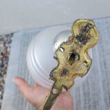 Pair of frosted glass wall lights with brass attachments, circa 1970