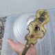 Pair of frosted glass wall lights with brass attachments, circa 1970