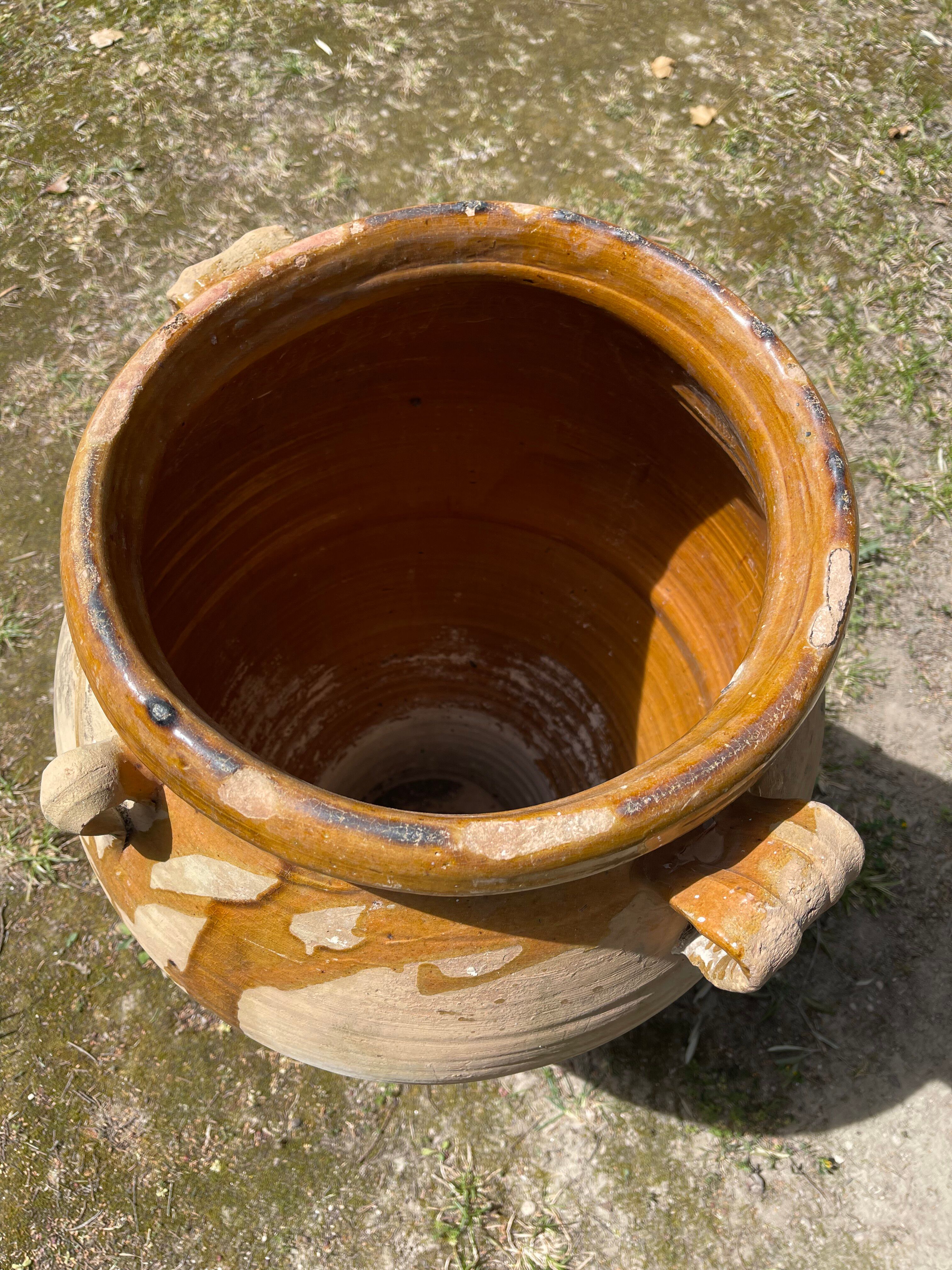 Ancient terracotta pottery jar