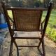 Teak and cane folding chair from the 1900s