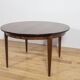 Table à manger ronde en palissandre de style mid-century moderne modèle 55 par Gunni Omann pour Omann Jun, Danemark, années 1960.
