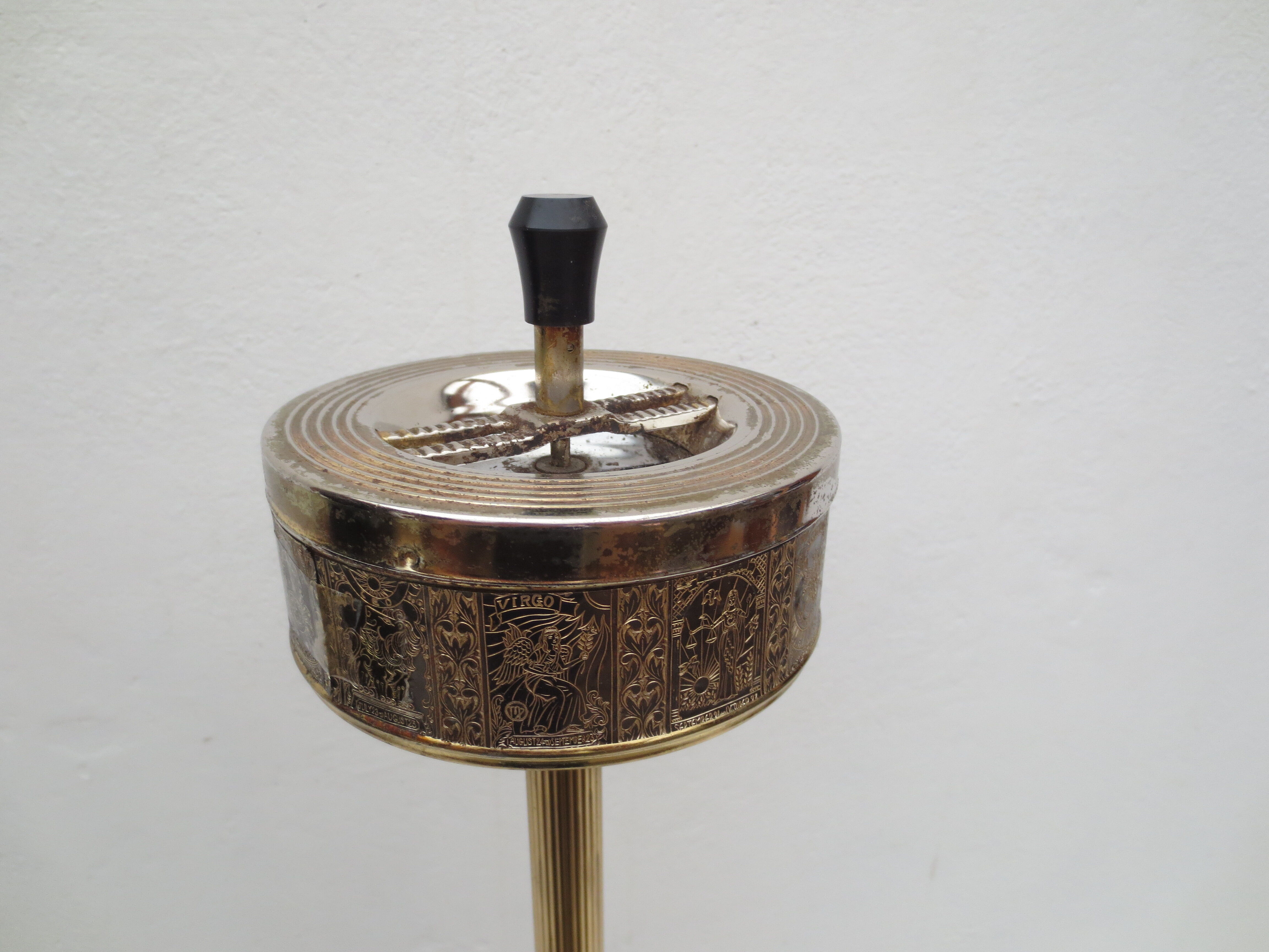 Old ashtray on foot year 50 in gilded brass