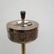 Old ashtray on foot year 50 in gilded brass