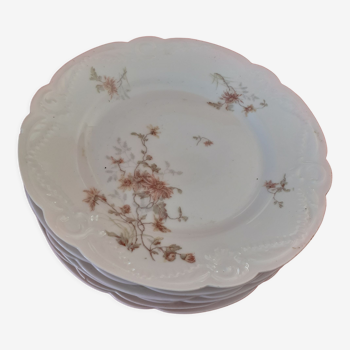 4 hollow plates limoges france. floral motif.