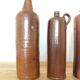 Set of 5 antique glazed stoneware bottles
