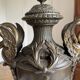 According to Émile Louis Picault, sculptor, a pair of large decorative vases.