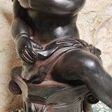 Patinated plaster sculpture - cherub