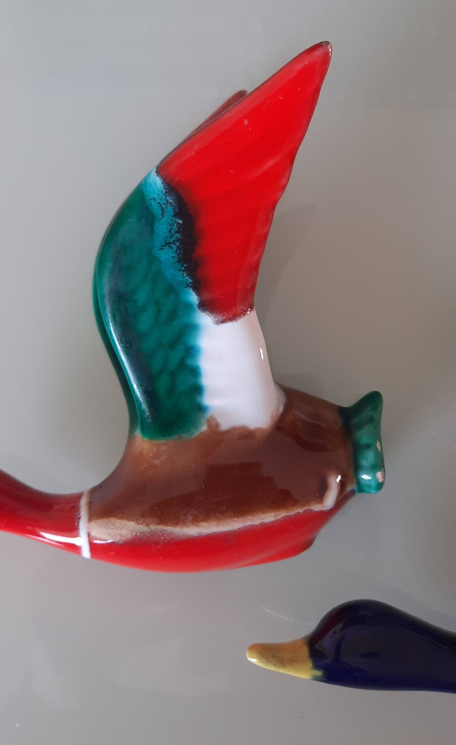 Pair of glazed ceramic wall ducks