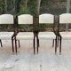 4 Scandinavian chairs in solid wood and white imitation leather