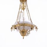 Brass chandelier from the first half of the 20th century.