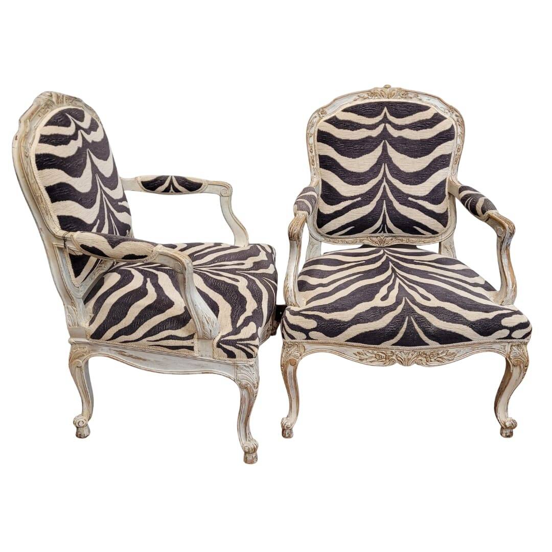 Pair of armchairs, carved and polychrome wood, printed zebra tapestry, Louis XV, circa 1790 – France