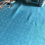 Old damask tablecloth tinted in lagoon blue
