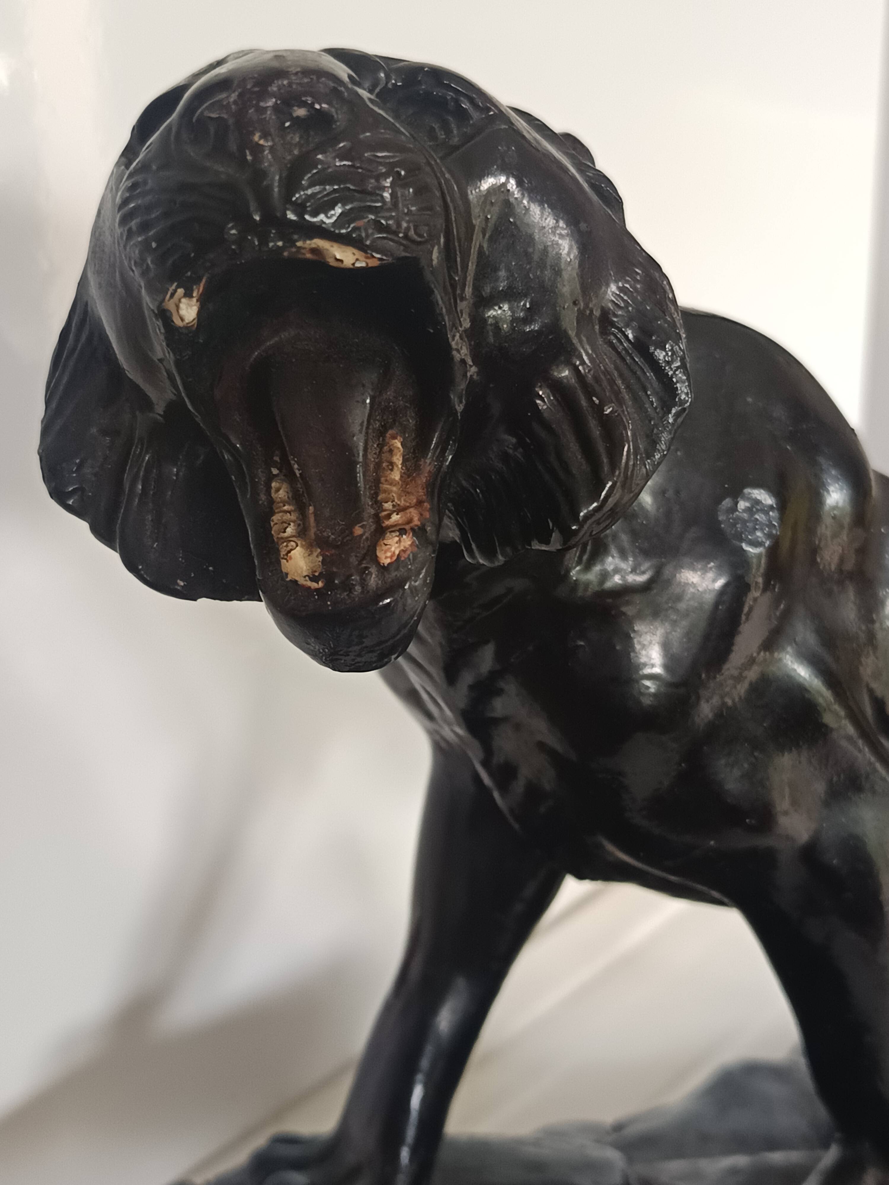 Large animal sculpture representing a roaring panther, signed BE.