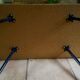 Table basse avec pieds compas