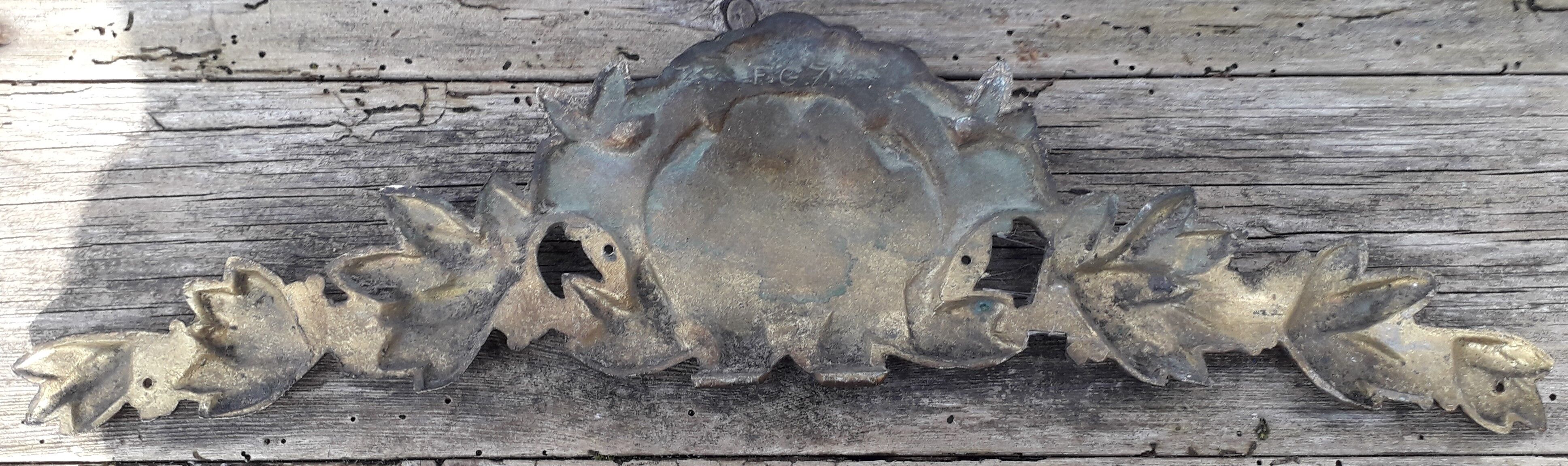Bronze pediment