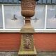 Large old cast iron planter on pedestal