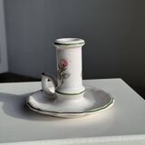 Small vintage hand-held candlestick in earthenware with green trim and floral decoration H10.5