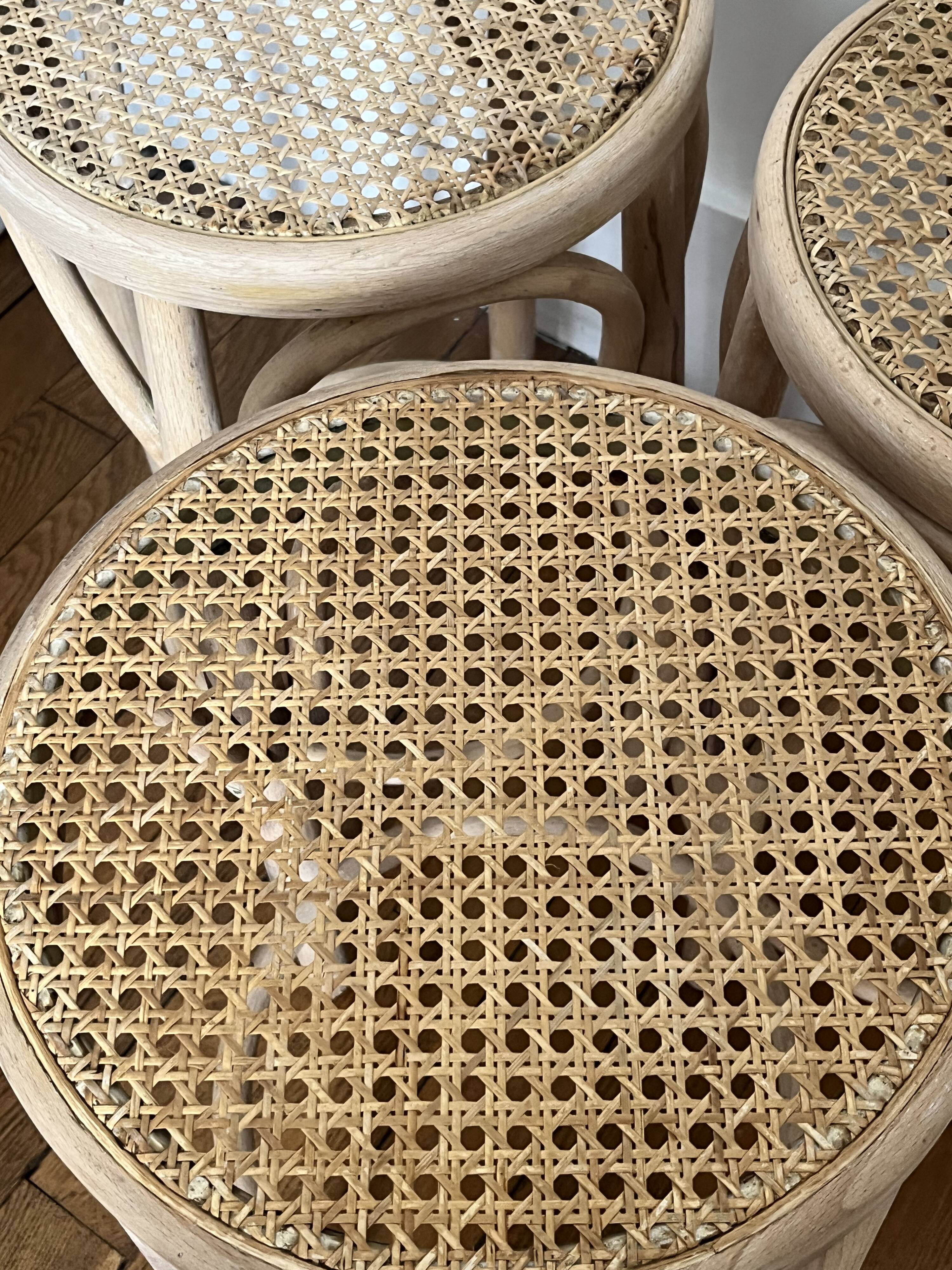 Pair of high chairs, curved wood and caning.