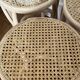 Pair of high chairs, curved wood and caning.