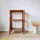 Shelf - rattan wood bookcase with a patina finish.