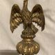 Pair of candle holders in wall, eagle pattern in gilded wood and brass