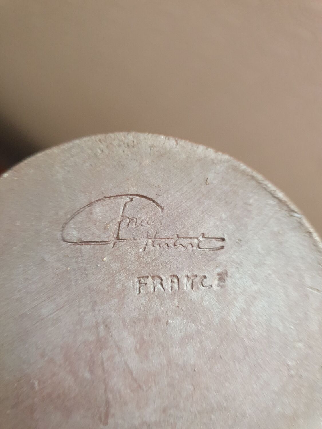 Vintage enameled stoneware pitcher signed