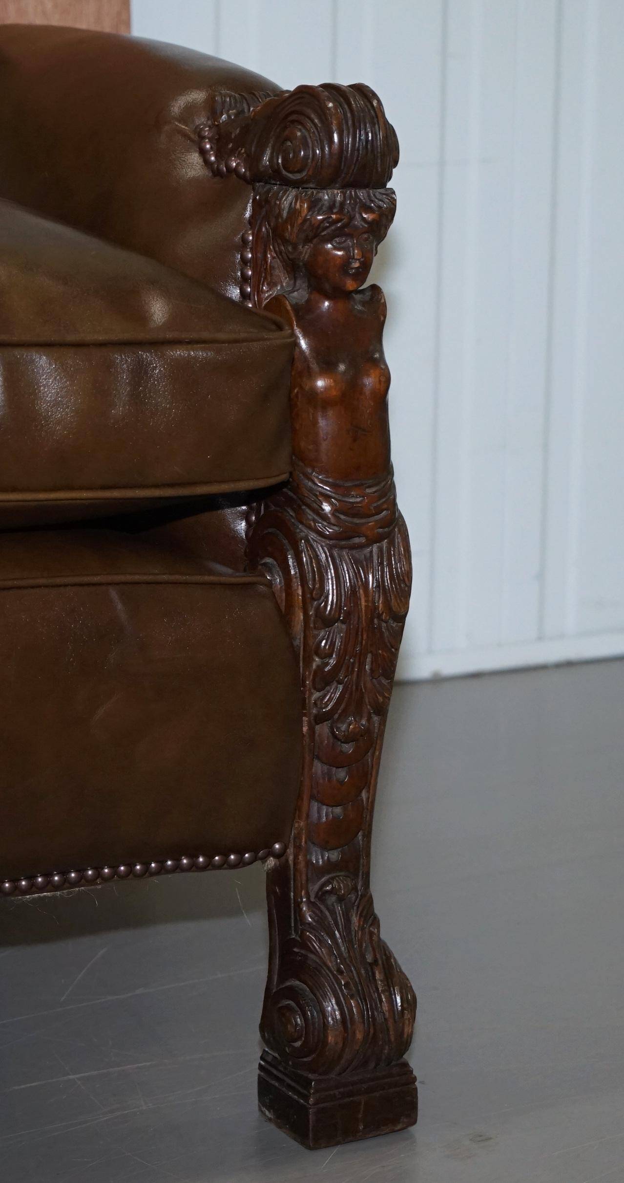 Restored Regency canapé in leather with sculpted Hermès frame.