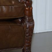 Restored Regency canapé in leather with sculpted Hermès frame.