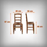 Pair of rush-seated chairs in cherry wood – late 19th century