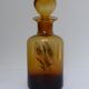 Decorated and signed perfume bottle, brown glass, painted "by hand Clary Paris"