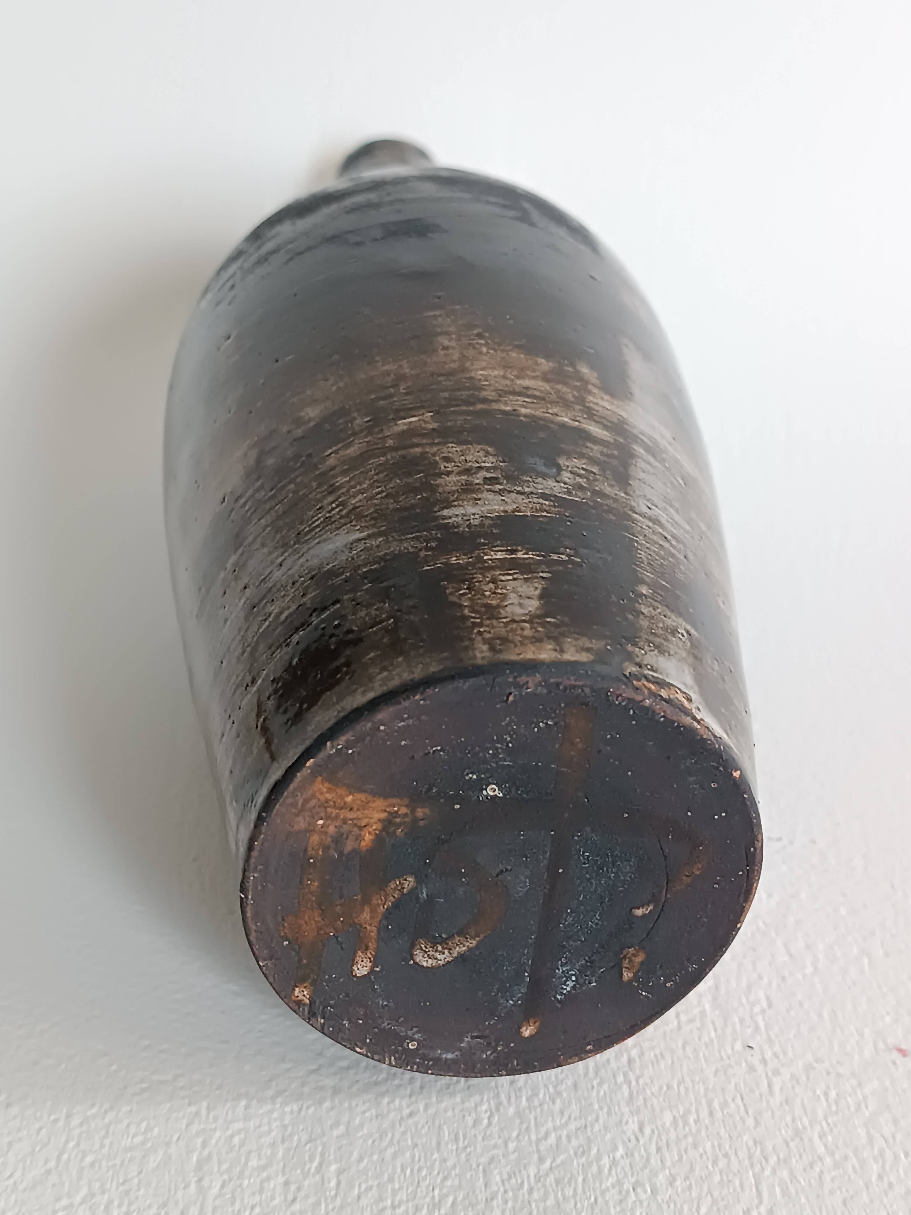 A bottle and six ceramic cups by Gérard Hofmann Vallauris 1950.