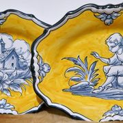 Pair of oval dishes in hand-painted faience with an Italian majolica spirit.